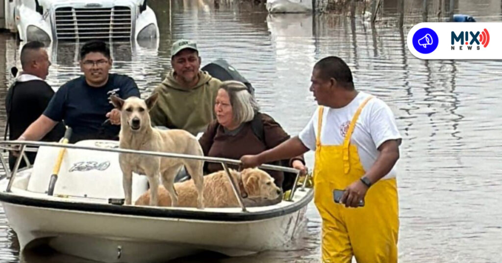 Bomberos salvan a dos personas y sus ‘lomitos’ atrapados por inundación en el PIVA